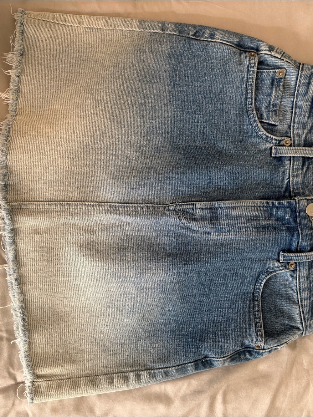 Light Wash Denim Mini Skirt with Frayed Hem